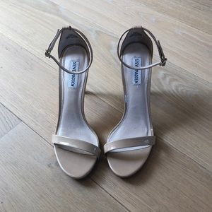 Steve Madden nude patent leather strappy sandals.